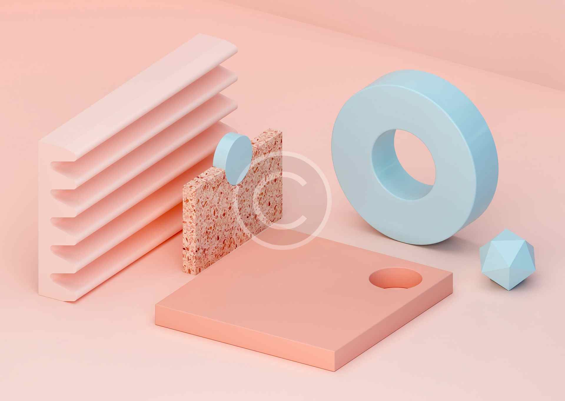 Minimalist pastel pink and blue geometric shapes arranged artistically.