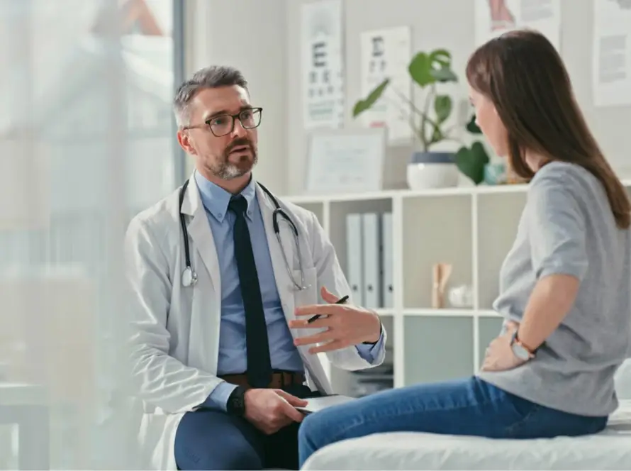 Doctor consulting a patient in a medical office.