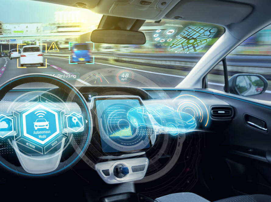 Futuristic car interior with holographic dashboard displays.