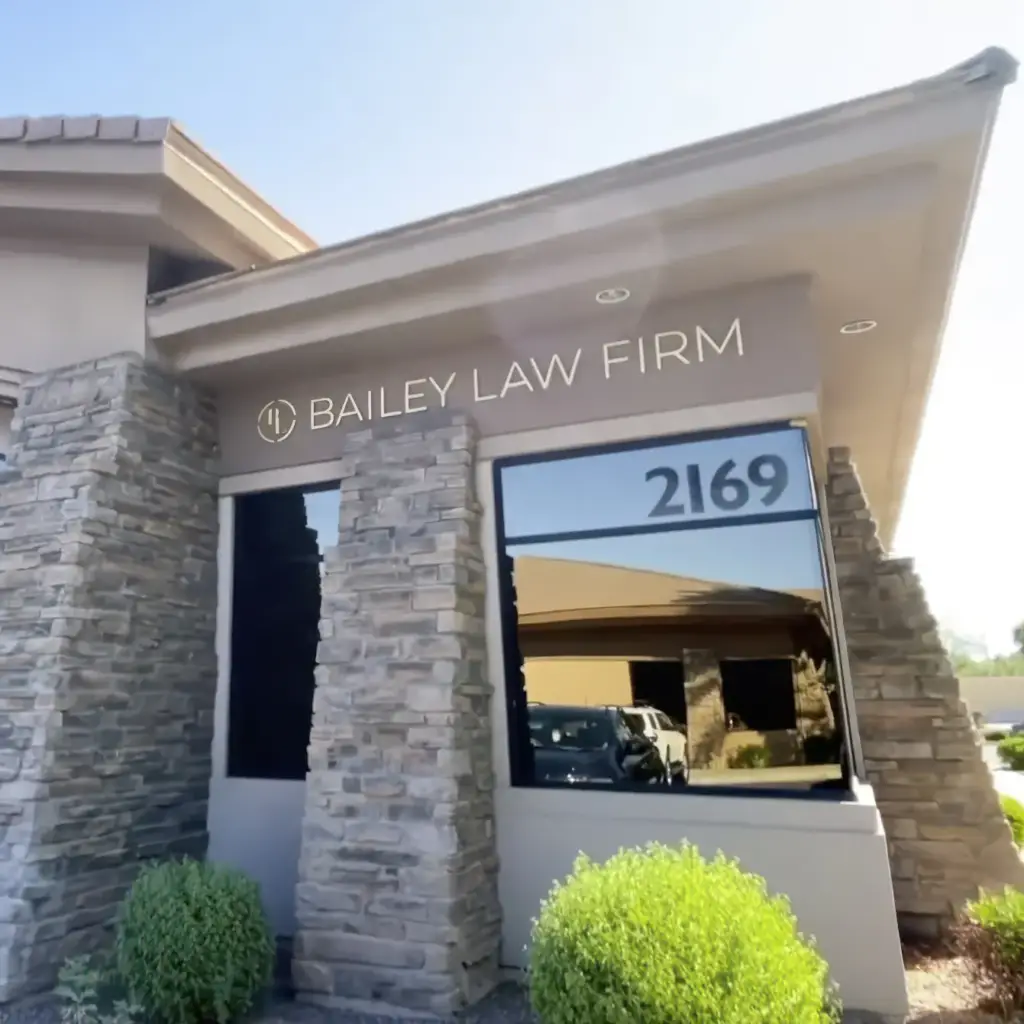 Entrance of a law firm with stone walls and address 2169.